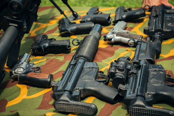 istock Shotguns, machine guns and pistols. 1047086644