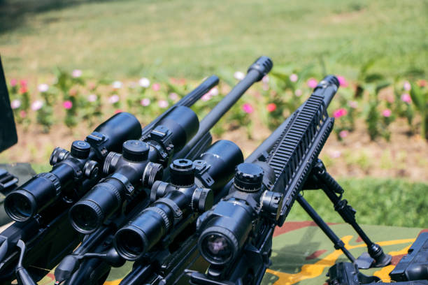 istock Sniper rifle outdoor. 1047086750