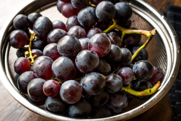 istock Bunch of Red Grapes in Metal Colander. 1047090654