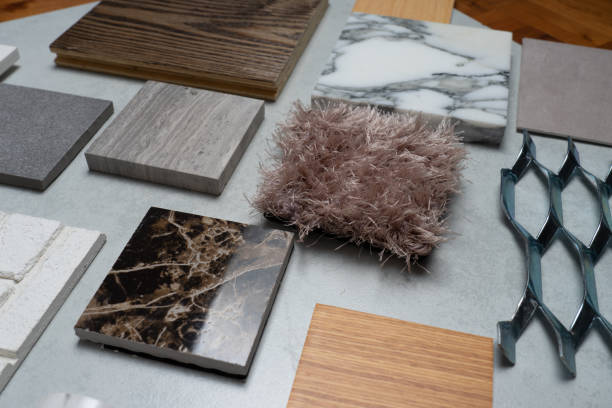 istock samples of material, wood , on concrete table.Interior design select material for idea. 1047098510