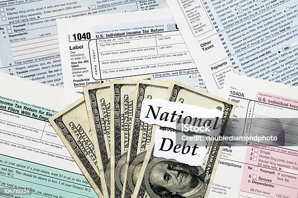 Foto de National Debt Formulários De Impostos e mais fotos de stock de Desespero - Desespero, Dinheiro para Queimar, Dívida