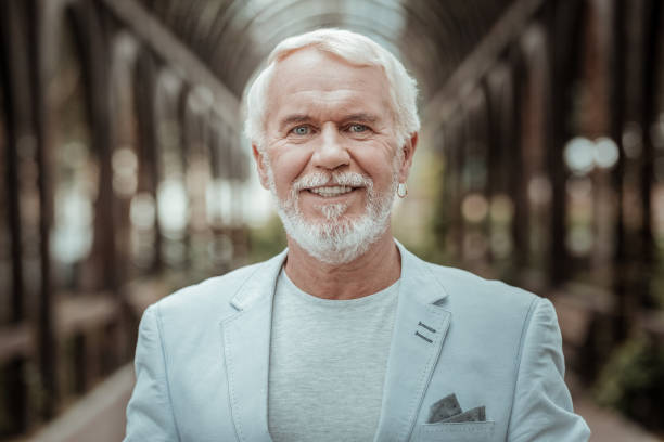 istock Portrait of pleased man that posing on camera 1047108922