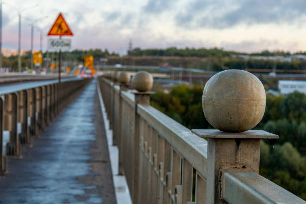 The railing of the bridge, the river Oka