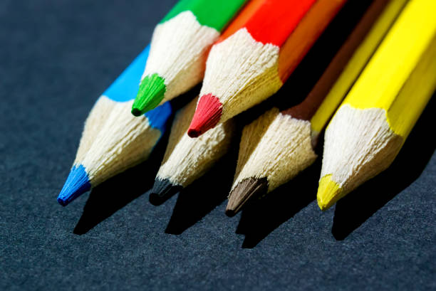 istock Photo of sharpened pencils close-up lying on a dark background 1047116222