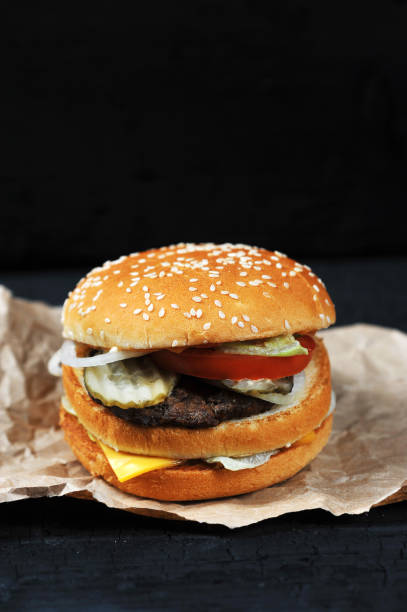 istock fast food Burger with cheese and beef 1047121808