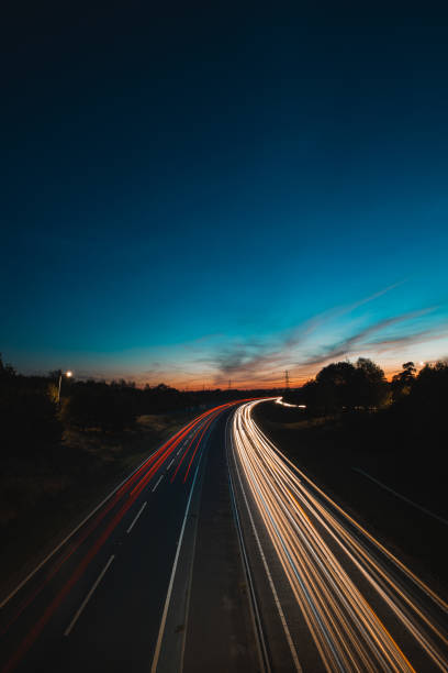 istock Headlights and Taillights on Motorway at Night in UK 1047122324
