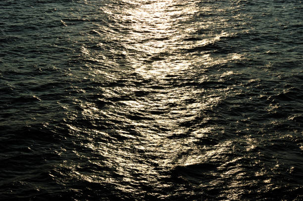 istock abstract background - moonlight path in the Baltic sea 1047122446