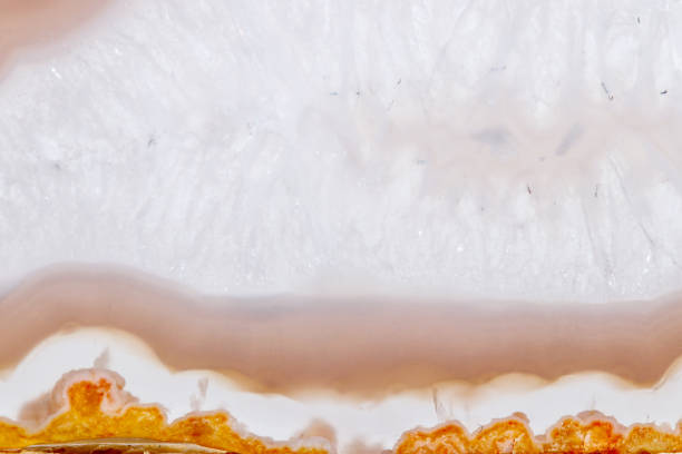 istock Macro mineral orange agate in crystals on white background 1047122452