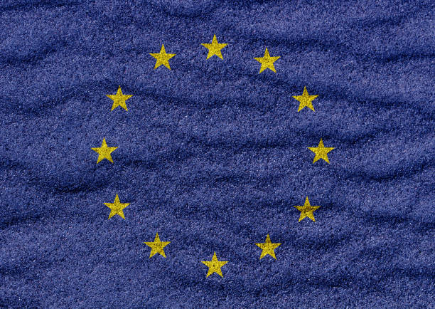 istock Euro flag on sand 1047125278