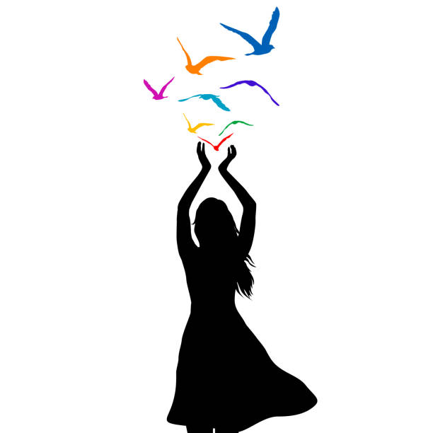 Abstract illustration of a woman silhouette with birds flying from her hands Abstract illustration of a woman silhouette with colored birds flying from her hands women flying bird freedom stock illustrations