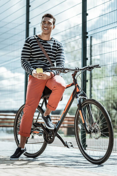 istock Positive nice guy inviting friends on riding 1047129694