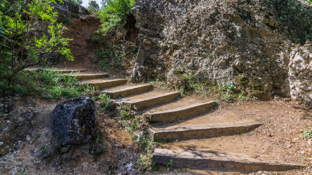 istock Wooden staircase on a mountain path 1047129772