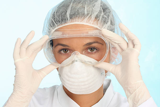 setting up protective workwear stock photo