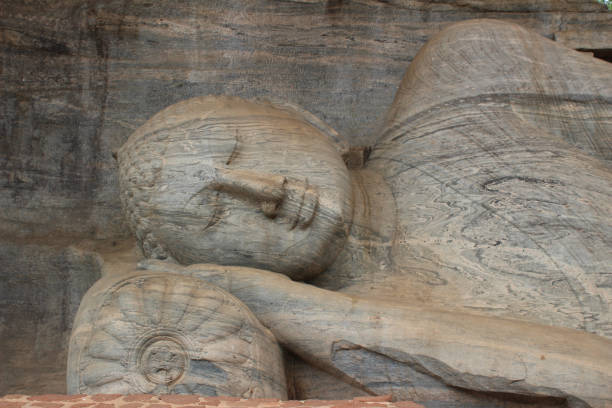istock Reclining Buddha sculpture at Gal Vihara 1047137438