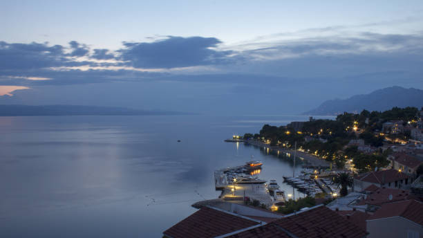 istock Evening harbor in Brela in Croatia 1047137780