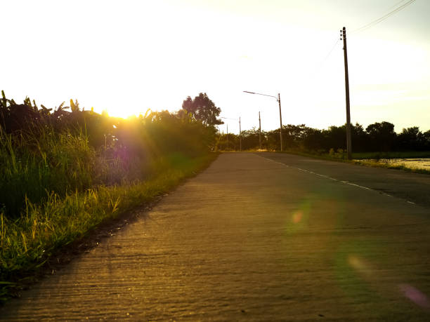 istock sunlight with the street 1047137898