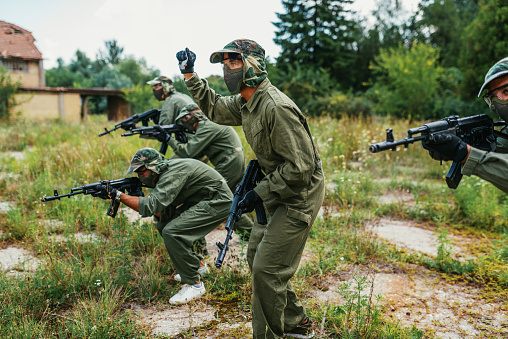 Popular warfare game with artificial - replica guns called airsoft, where players develop strategies and encourage teamwork.