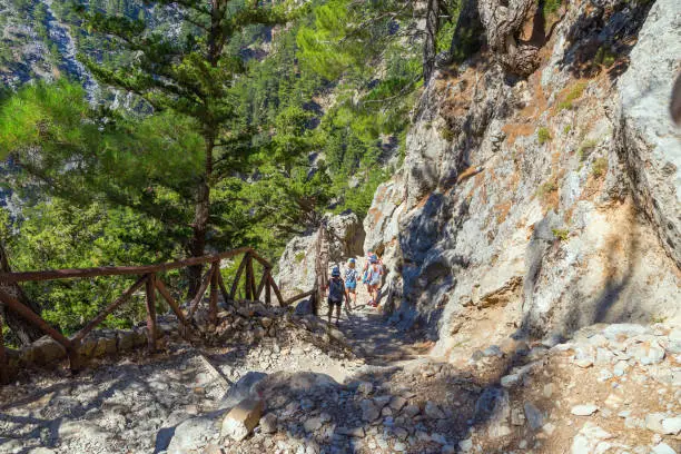 Photo of Trail in the Samaria Gorge, the largest gorge in Europe. Southwestern part of the island of Crete, Greece. Famous gorge in the White Mountains.