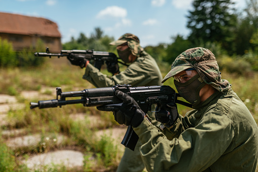 Popular warfare game with artificial - replica guns called airsoft, where players develop strategies and encourage teamwork.