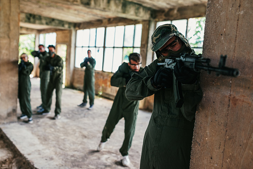 Popular warfare game with artificial - replica guns called airsoft, where players develop strategies and encourage teamwork.