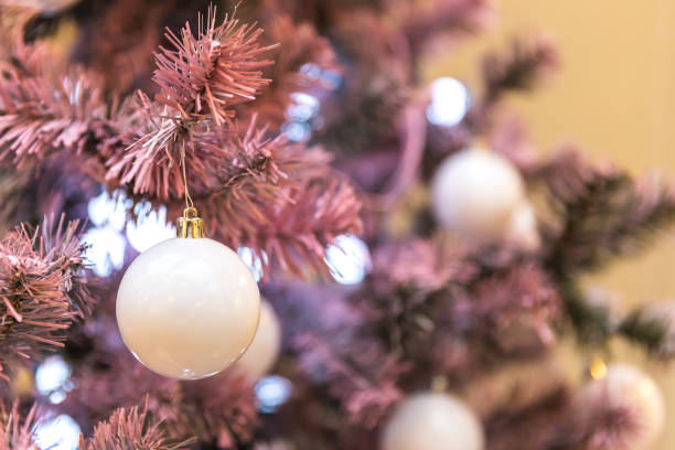 Pink Christmas tree with holiday decoration