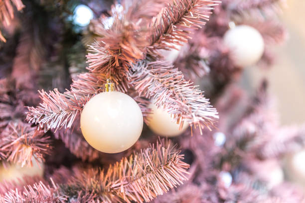 istock Pink Christmas tree with holiday decoration 1047159422