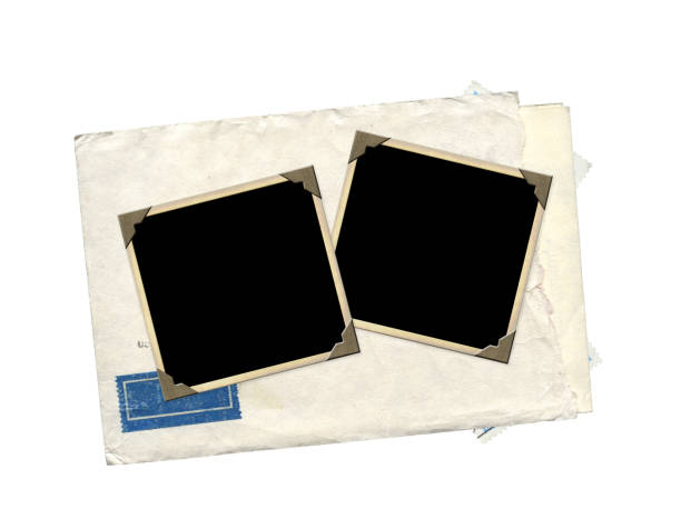 istock Envelope and old photo. Isolated on white background 1047163816