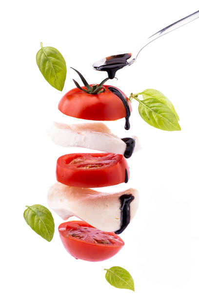 gastronomic caprese salad with mozzarella and tomato succulent caprese salad with mozzarella cheese and tomato topped with a glaze of balsamic vinegar balsamic vinegar stock pictures, royalty-free photos & images