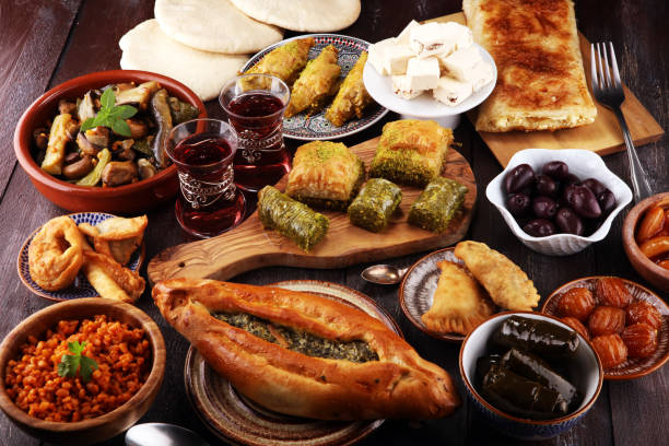 istock Middle eastern or arabic dishes and assorted meze, concrete rustic background. sambusak. Turkish Dessert Baklava with pistachio. Sarma. Halal food. Lebanese 1047167770