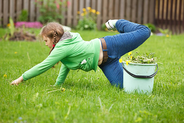 istock Little girl working in garden 104716993