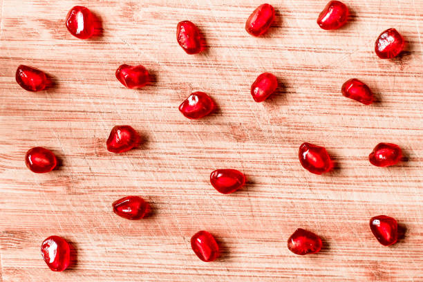 istock Red pomegranate fruit seed. Shallow depth of field. Retro vintage effect 1047180114