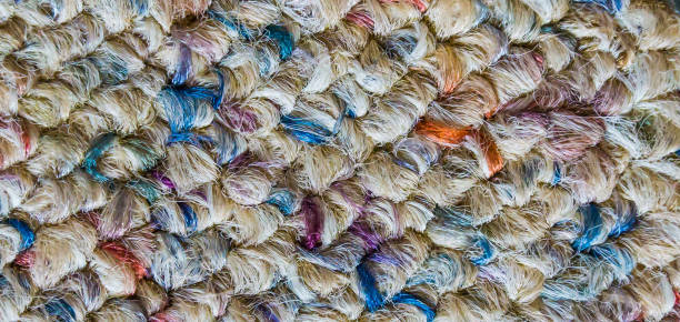 istock Soft wool floor fabric covering with different colors in macro close up background texture 1047184106