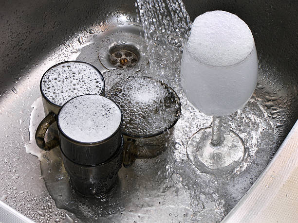 istock Dishes - Glasses and Crockery in Soap 104718444