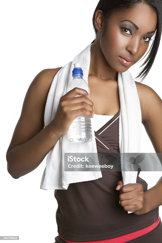 Mujer con botella de agua - Foto de stock de Adolescencia libre de derechos