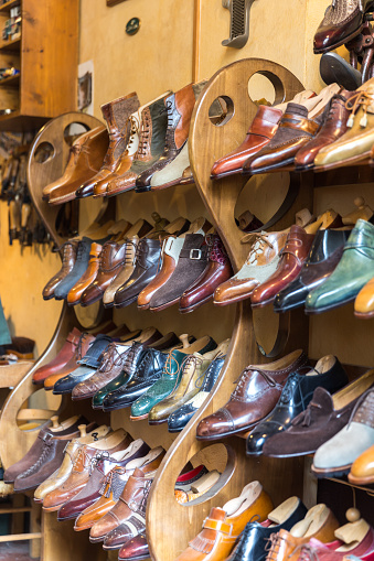 FLORENCE, ITALY, MAY 04, 2018: Fashion classical polished men's handmade shoes selling in shop in Florence Italy