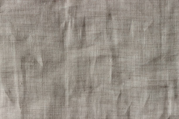 istock Natural linen cloth background close 1047206876