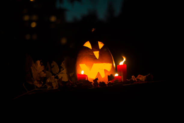 istock Halloween pumpkin at night. 1047207810
