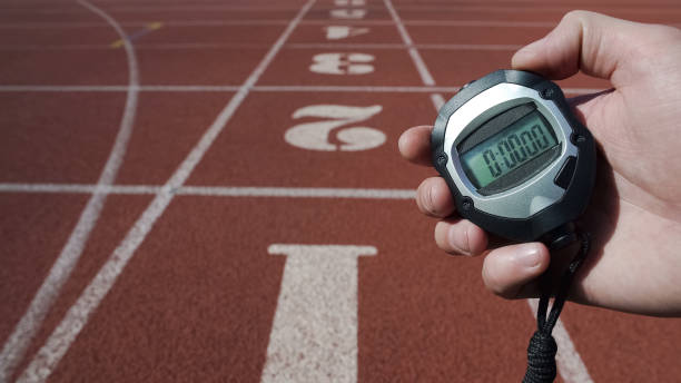 istock Male hand holding stopwatch with zero time, new life stage beginning fresh start 1047207976