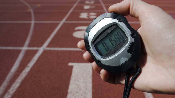 istock Hand holding stopwatch with time 15 seconds, bad result, failure in competition 1047207996