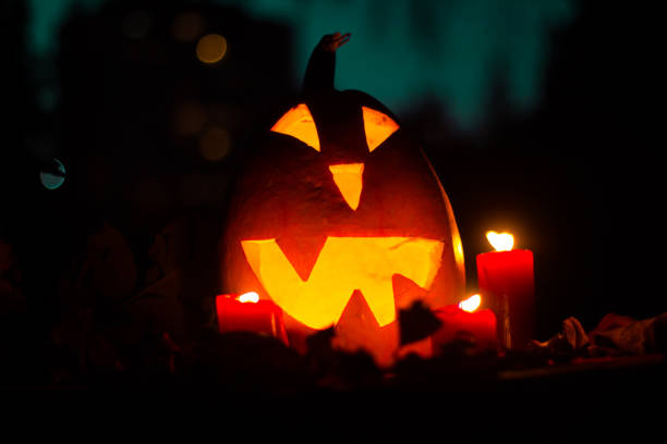 istock Halloween pumpkin and night sky. 1047213158