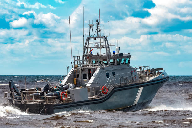 istock Grey military ship at sea 1047220076