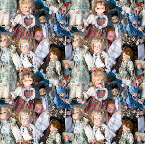 istock seamless pattern background with many used old dolls on a heap 1047227042