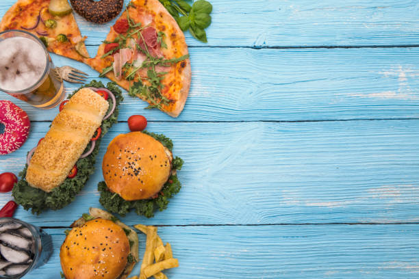 Bunch of food on Blue Picnic Table
