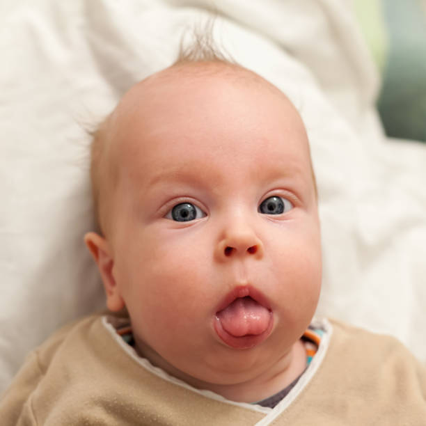 istock 3 month old baby boy - first words 1047227306
