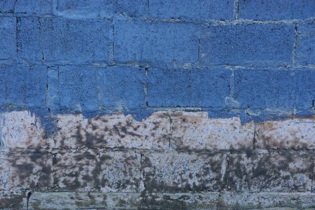 istock blue gray stone texture of dirty bricks in the wall 1047230296