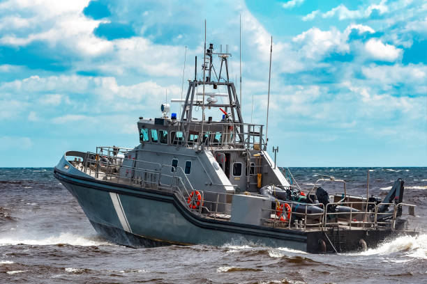 istock Grey military ship at sea 1047230328
