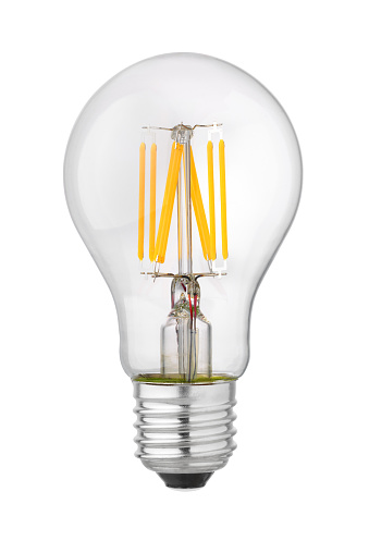 Modern transparent LED filament bulb isolated on white background