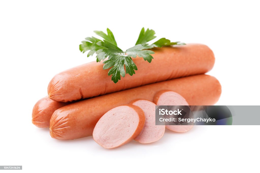 Three sausages with slices and fresh parsley isolated on white background Sausage Stock Photo