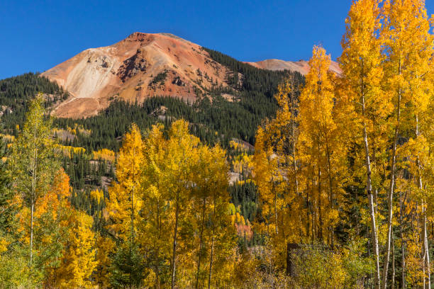 istock Red Mountains and Golden Aspens 1047241886