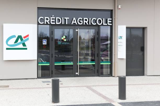 Credit Agricole agency in France Orleans, France - March 19, 2017: Credit Agricole agency. Credit Agricole is a French network of cooperative and mutual banks comprising the 39 Credit Agricole Regional Banks bank entrance stock pictures, royalty-free photos & images